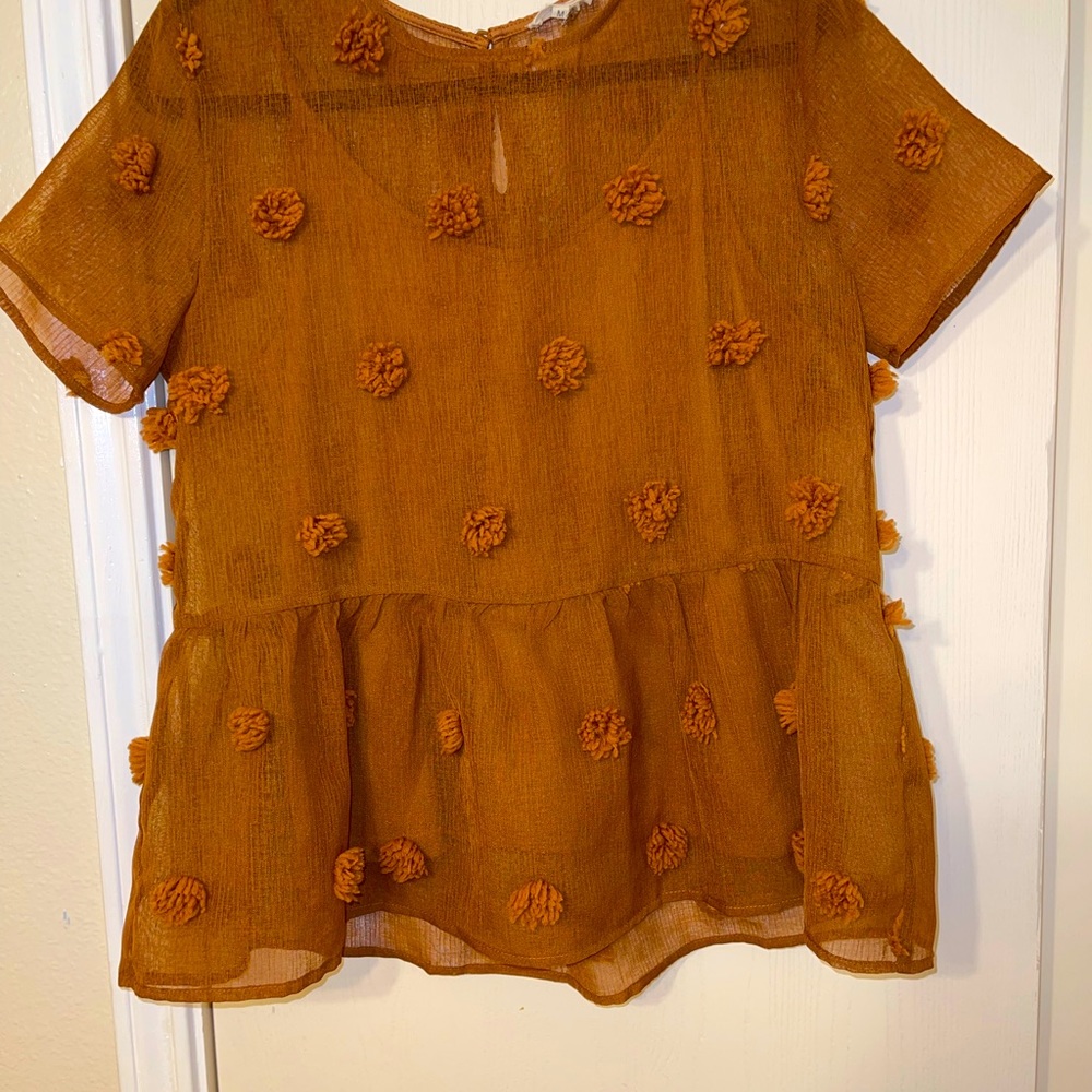 Eclectic Peplum Top.
